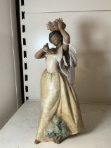 LLADRO FIGURE OF FLOWER LADY AND BIRD, 29 CMS.