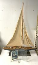 A PAINTED MODEL RACING YACHT - THE FLYING FIFTEEN 1947 - 1997 CLASSIC SERIES COWES.