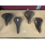 FOUR ANTIQUE LEATHER BICYCLE SEATS INCLUDES BROOKS ( B17N)