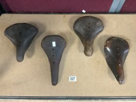 FOUR ANTIQUE LEATHER BICYCLE SEATS INCLUDES BROOKS ( B17N)