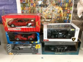 TONKA MODEL FERRARI IN BOX, MAISTO MERCEDES CLK GTR AND THREE OTHER MODEL SUPER CARS.