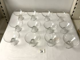 A SET OF TWELVE SUNDAE GLASSES.