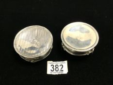 TWO HALLMARKED SILVER CIRCULAR RING BOXES, 1 WITH ENGINE TURNED LID, 1918, OTHER WORN MARK .