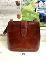 BROWN LEATHER SHOULDER BAG MARKED CARTIER PARIS