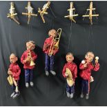 BANDSMEN, SAXOPHONIST, TROMBONIST, TRUMPETER, CYMBALIST AND MARIONETTE PLAYING MARACAS; 54CM. CAN BE