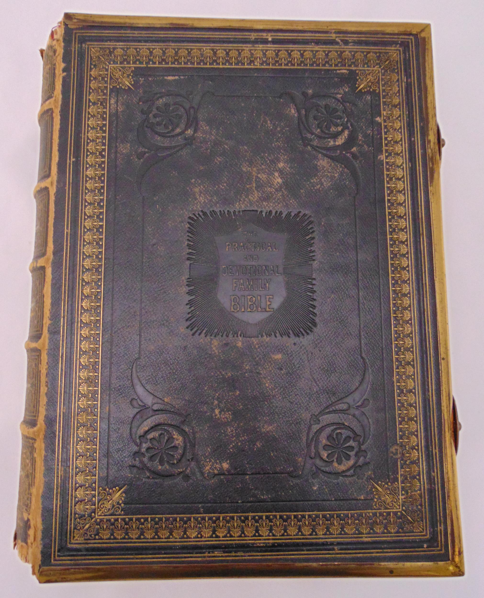 The Practical and Devotional Family Bible hardbound volume with gilded metal mounts