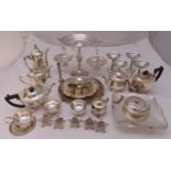 A quantity of silver plate to include trays, a dish, teapots and napkin rings