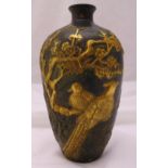 An oriental 19th century bronze and gilded baluster vase, decorated with birds, flowers and leaves