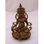 A gilded bronze Buddha on raised oval base, 22 x 15cm