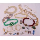 A quantity of costume jewellery to include necklaces, bangles, earrings and brooches