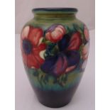 Moorcroft vase decorated with flowers and leaves, signed to the base, 24cm (h)