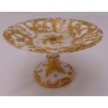 Meissen cake stand decorated with gilded flowers and leaves on raised circular base, marks to the