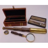 Chas F. Thackery cased medical instrument and a cased brass telescope, magnifying glass and a