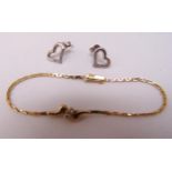 A 9ct yellow gold and diamond bracelet and a pair of 9ct white gold and diamond heart shaped