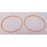 A pair of 18ct yellow gold bangles, approx total weight 11.4g