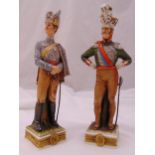 Two Capodimonte figurines of Hussars in full military uniform on raised square bases, marks to the
