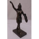 An antique bronzed figurine of a Roman warrior with shield on raised rectangular base, 51cm (h)