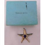 Tiffany & Company sterling silver Starfish Brooch, with an 18ct yellow gold bezel set with a Lapis