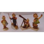 Four Hummel figurines of children at play