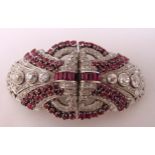 A ruby and diamond double clip brooch, set with calibre and circular cut rubies, single and rose cut