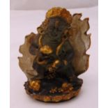 A Tibetan glass painted and gilded Buddha, 10 x 9cm