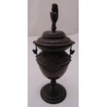 A bronze Aesthetic movement vase and cover on raised circular base with bird finial to pull off