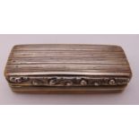 A George IV hallmarked silver vinaigrette, rounded rectangular, ribbed sides and hinged cover,