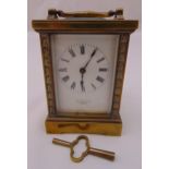 Drew and Sons of Leadenhall London brass carriage clock, white enamel dial with Roman numerals to