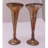 A pair of hallmarked silver trumpet vases on circular bases, Birmingham 1920, 22.5cm (h) A/F