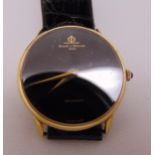 Baume and Mercier 18ct gold gentlemans wristwatch on a leather strap