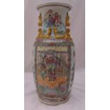 An early 20th century Cantonese style vase of cylindrical form the sides decorated with interior