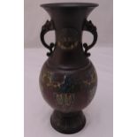 An oriental cloisonn‚ baluster form vase with side handles on raised circular base, 37cm (h)