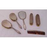 A hallmarked silver six piece dressing table set to include clothes brushes, hair brushes, hand