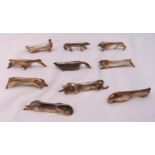 A set of ten Art Deco Sandoz for Gallia silver plated knife rests in the form of stylised animals