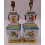 A pair of Cantonese vases of tapering rectangular form decorated with figures on raised square base,
