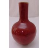 A Chinese copper red glazed baluster vase, 33cm (h)