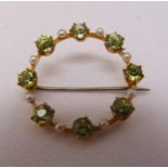 A Victorian gold, peridot and seed pearl brooch, gold tested 15ct, approx total weight 3.9g
