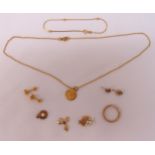 A quantity of 9ct gold jewellery to include a bracelet, a pair of stud earrings, a pair of star
