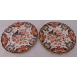 A pair of Royal Crown Derby cabinet plates decorated with flowers and leaves, 23cm (d)