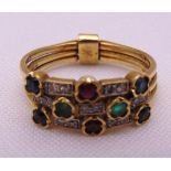 18ct yellow gold three strand ring set with diamonds, emeralds, rubies and sapphires, approx total