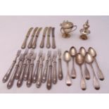 A quantity of hallmarked silver to include a mustard pot, a salt, teaspoons and dessert eaters