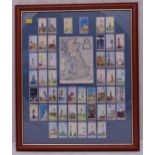 A framed and glazed composition of cigarette cards highlighting lighthouses around Great Britain,