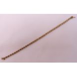 14ct yellow gold and diamond tennis bracelet, approx total weight 7.6g