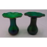 A pair of Art Nouveau style green vases, pear shaped with naturalistic everted rims, 11.5cm (h)