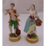 Augustus Rex a pair of figurines of a boy and girl with bird cages, marks to the bases, 20cm (h)