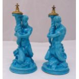 A pair of 19th century Wedgwood turquoise glazed figurines of Neptune on raised circular base,