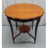 An Edwardian mahogany circular occasional table on four cabriole legs, 71 x 68.5 x 67cm