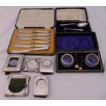 A quantity of silver and white metal to include a cased set of salts, a pusher and spoon, butter