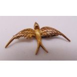 Gold brooch of a bird in flight, gold tested 18ct, approx total weight 3.6g