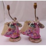 A pair of early 20th century ceramic figural table lamps to include shades, 40cm (h)